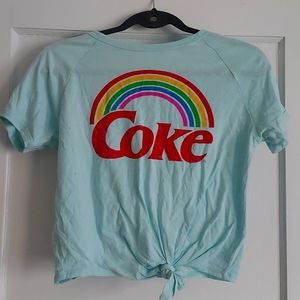 A blue XS coca cola t shirt